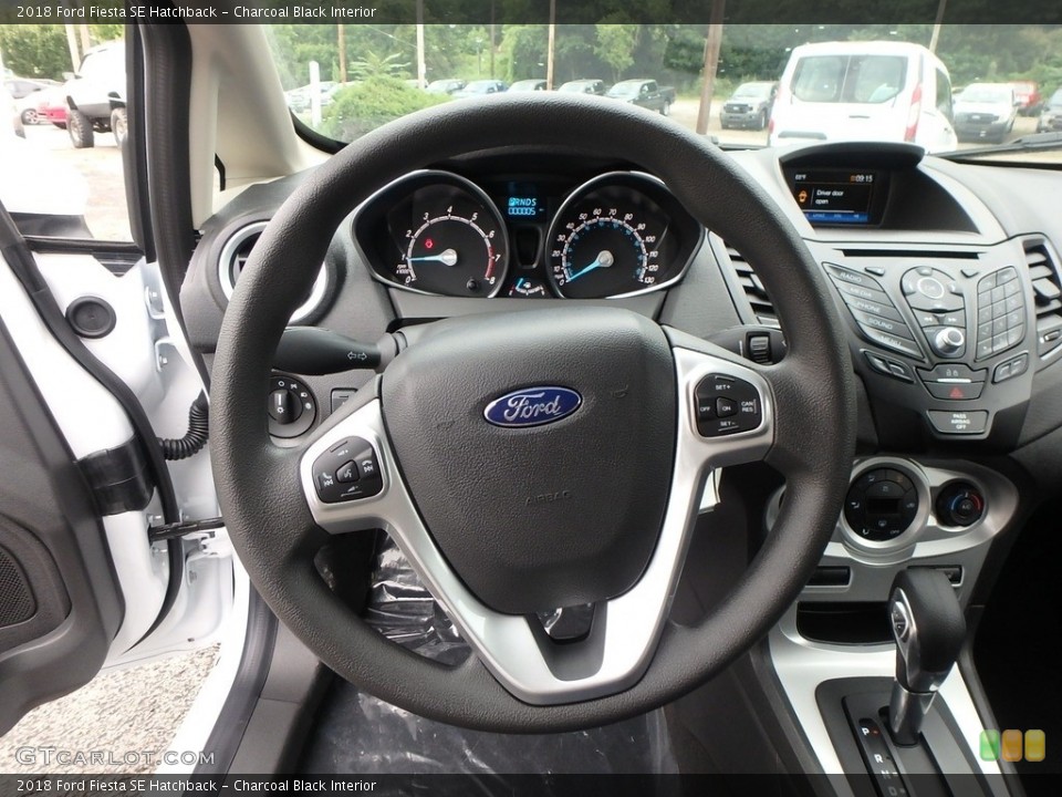 Charcoal Black Interior Steering Wheel for the 2018 Ford Fiesta SE Hatchback #128832974