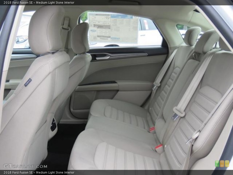 Medium Light Stone Interior Rear Seat for the 2018 Ford Fusion SE #128980801