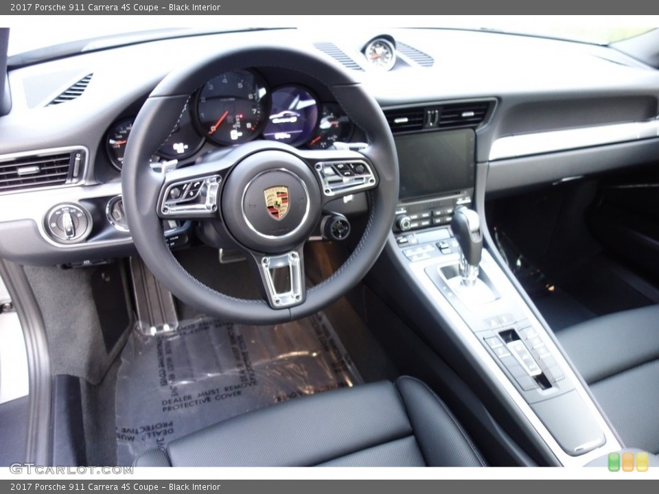 Black Interior Dashboard for the 2017 Porsche 911 Carrera 4S Coupe #129240999