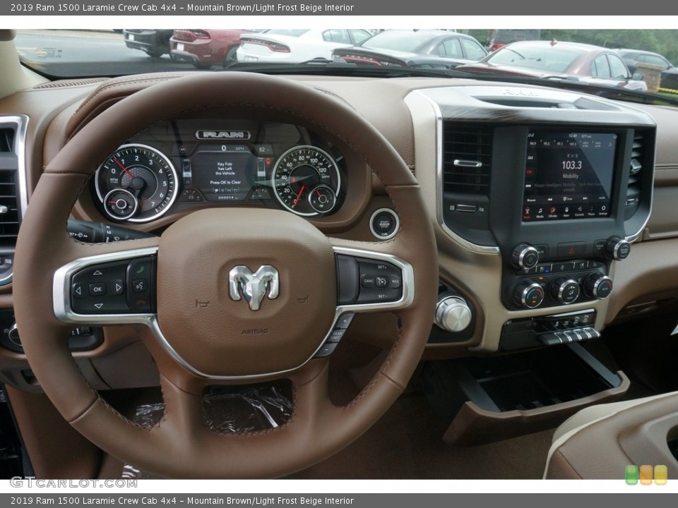 Mountain Brown/Light Frost Beige Interior Dashboard for the 2019 Ram 1500 Laramie Crew Cab 4x4 #129365558