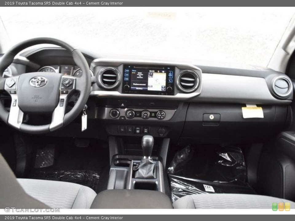Cement Gray Interior Dashboard for the 2019 Toyota Tacoma SR5 Double Cab 4x4 #129575019