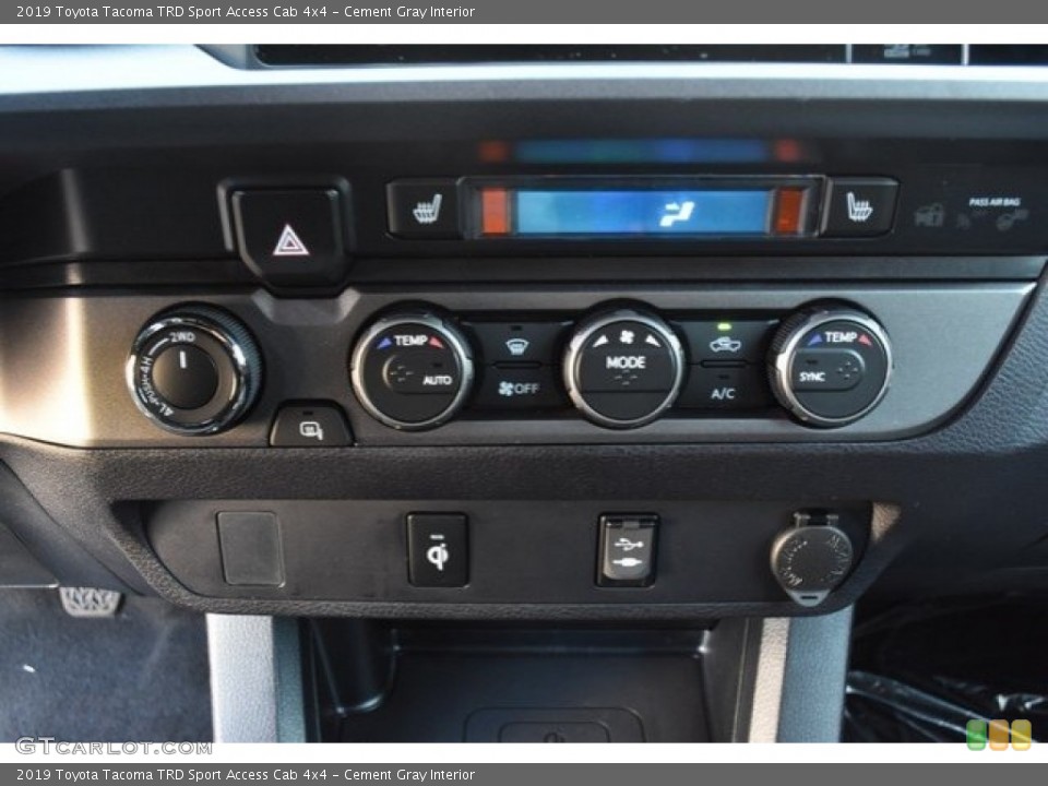 Cement Gray Interior Controls for the 2019 Toyota Tacoma TRD Sport Access Cab 4x4 #129596140
