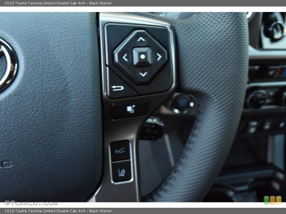 Black Interior Steering Wheel for the 2019 Toyota Tacoma Limited Double Cab 4x4 #129603337