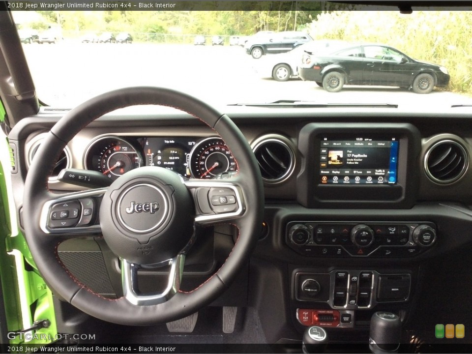 Black Interior Dashboard for the 2018 Jeep Wrangler Unlimited Rubicon 4x4 #129880739
