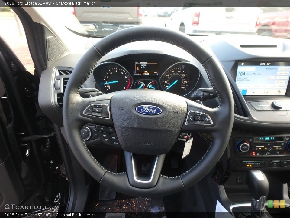 Charcoal Black Interior Steering Wheel for the 2018 Ford Escape SE 4WD #129959995