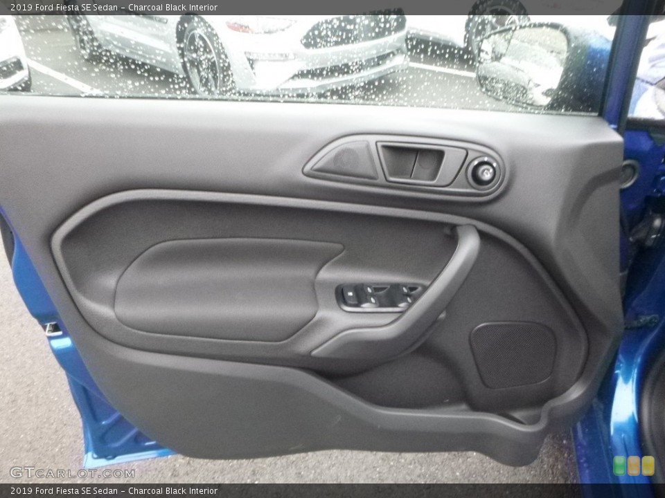 Charcoal Black Interior Door Panel for the 2019 Ford Fiesta SE Sedan #130023784