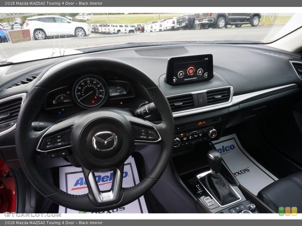 Black Interior Dashboard for the 2018 Mazda MAZDA3 Touring 4 Door #130068185