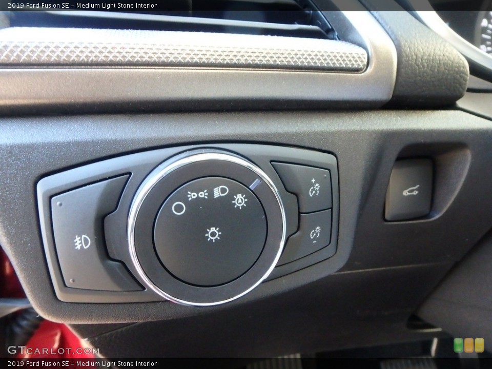 Medium Light Stone Interior Controls for the 2019 Ford Fusion SE #130076889