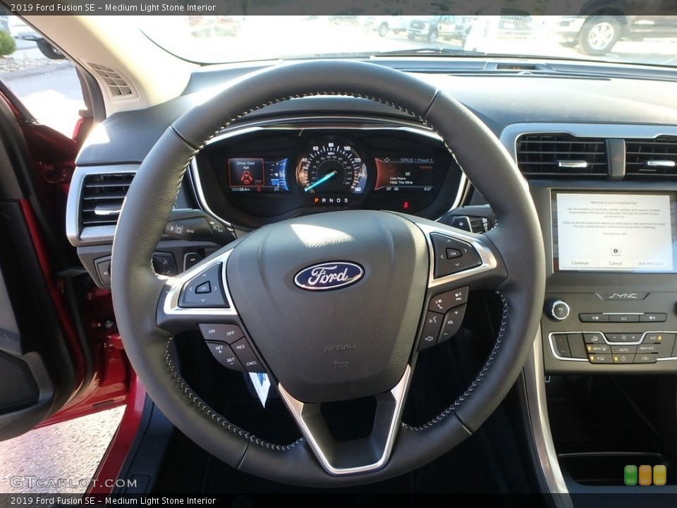 Medium Light Stone Interior Steering Wheel for the 2019 Ford Fusion SE #130076916
