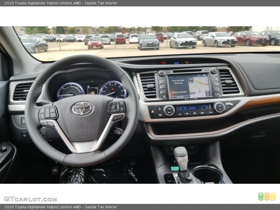 Saddle Tan Interior Dashboard for the 2019 Toyota Highlander Hybrid Limited AWD #130117064