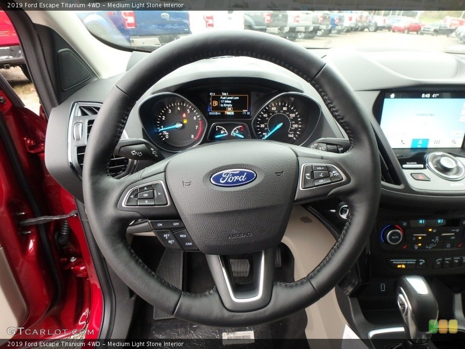Medium Light Stone Interior Steering Wheel for the 2019 Ford Escape Titanium 4WD #130134839