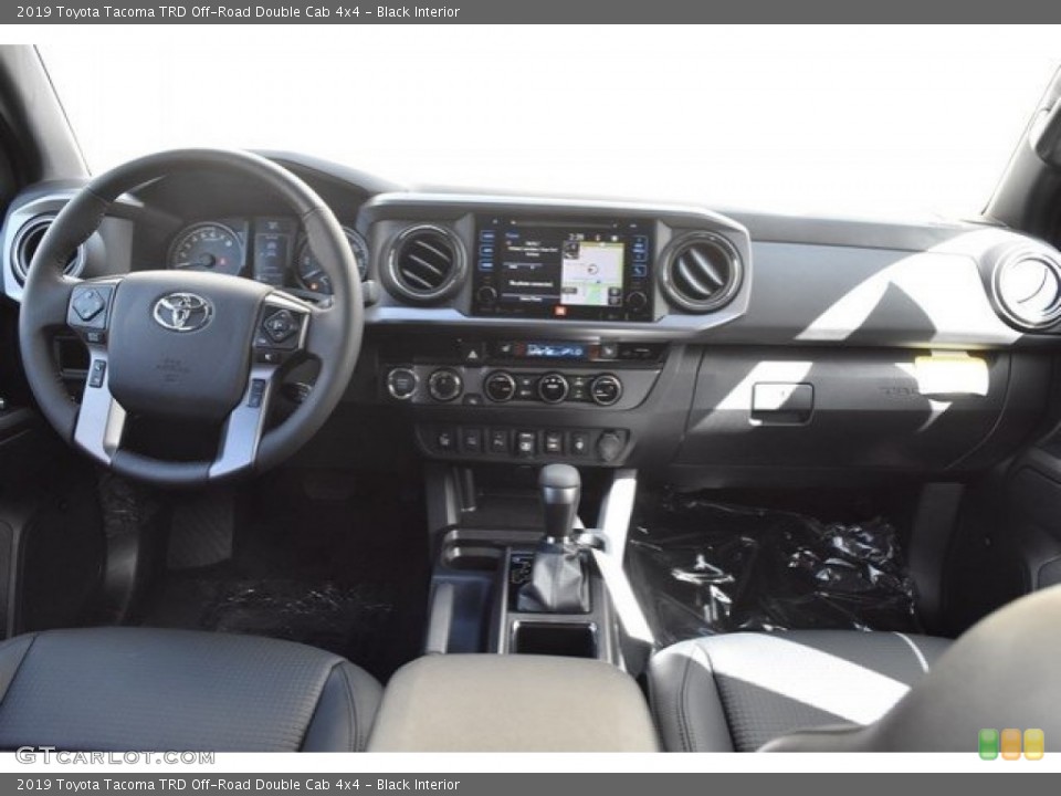 Black Interior Dashboard for the 2019 Toyota Tacoma TRD Off-Road Double Cab 4x4 #130156854