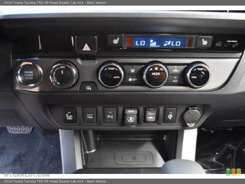 Black Interior Controls for the 2019 Toyota Tacoma TRD Off-Road Double Cab 4x4 #130157196