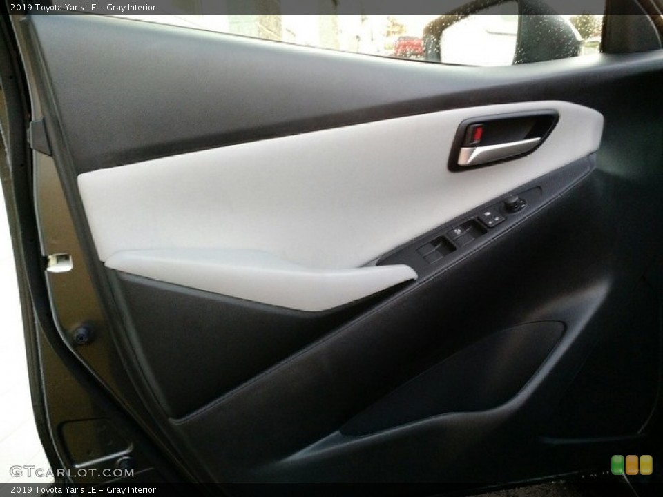 Gray Interior Door Panel for the 2019 Toyota Yaris LE #130345487