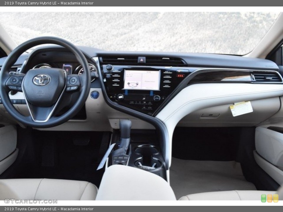 Macadamia Interior Dashboard for the 2019 Toyota Camry Hybrid LE #130408547