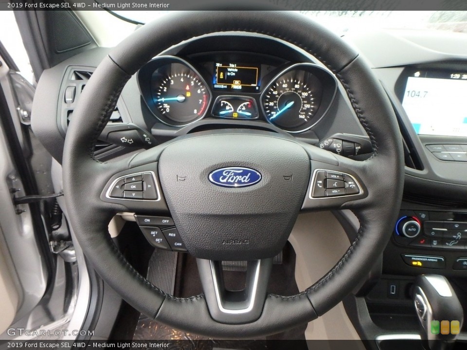 Medium Light Stone Interior Steering Wheel for the 2019 Ford Escape SEL 4WD #130417058