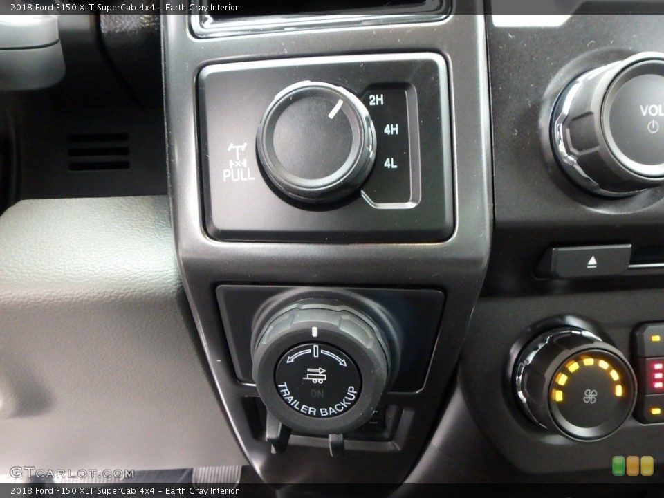 Earth Gray Interior Controls for the 2018 Ford F150 XLT SuperCab 4x4 #130417853