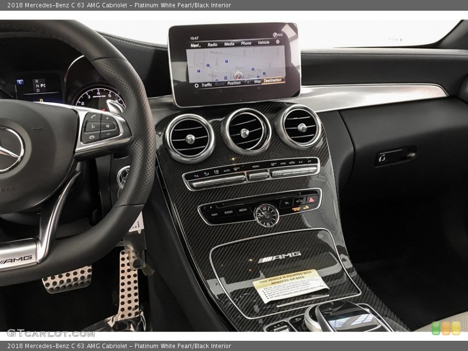 Platinum White Pearl/Black Interior Controls for the 2018 Mercedes-Benz C 63 AMG Cabriolet #130431373