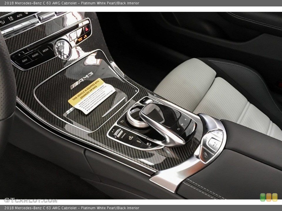 Platinum White Pearl/Black Interior Controls for the 2018 Mercedes-Benz C 63 AMG Cabriolet #130431703