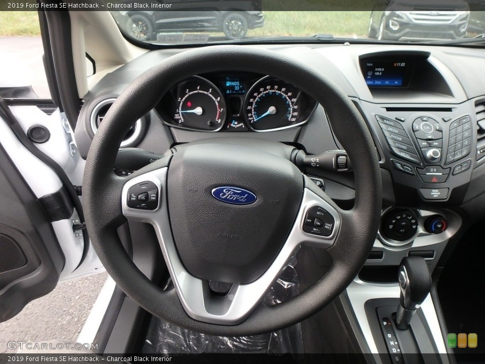 Charcoal Black Interior Steering Wheel for the 2019 Ford Fiesta SE Hatchback #130440104