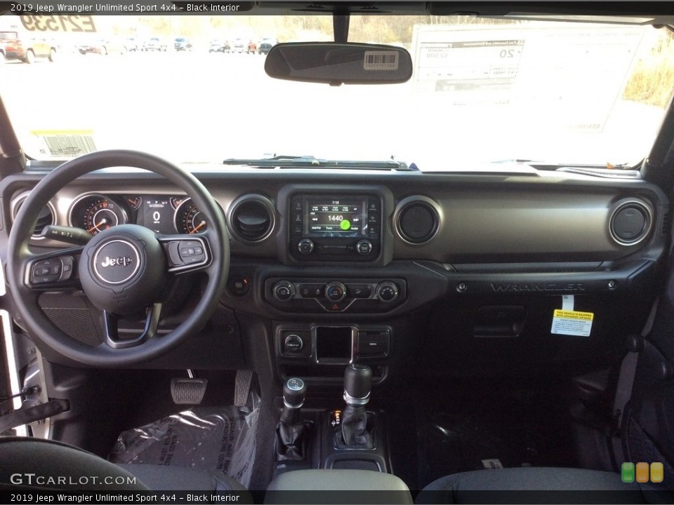 Black Interior Dashboard for the 2019 Jeep Wrangler Unlimited Sport 4x4 #130441729
