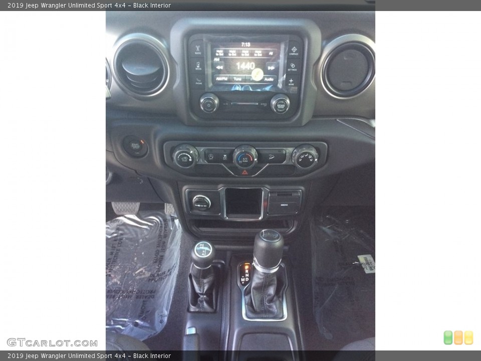 Black Interior Controls for the 2019 Jeep Wrangler Unlimited Sport 4x4 #130441777