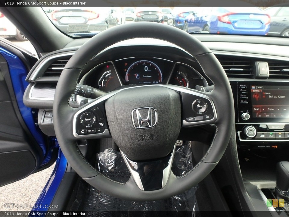 Black Interior Steering Wheel for the 2019 Honda Civic Sport Coupe #130444459