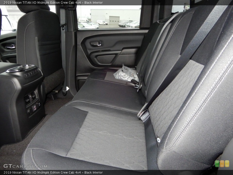 Black Interior Rear Seat for the 2019 Nissan TITAN XD Midnight Edition Crew Cab 4x4 #130448063