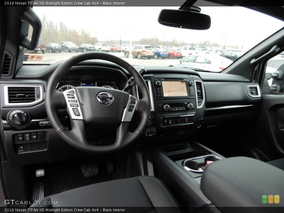 Black Interior Photo for the 2019 Nissan TITAN XD Midnight Edition Crew Cab 4x4 #130448105