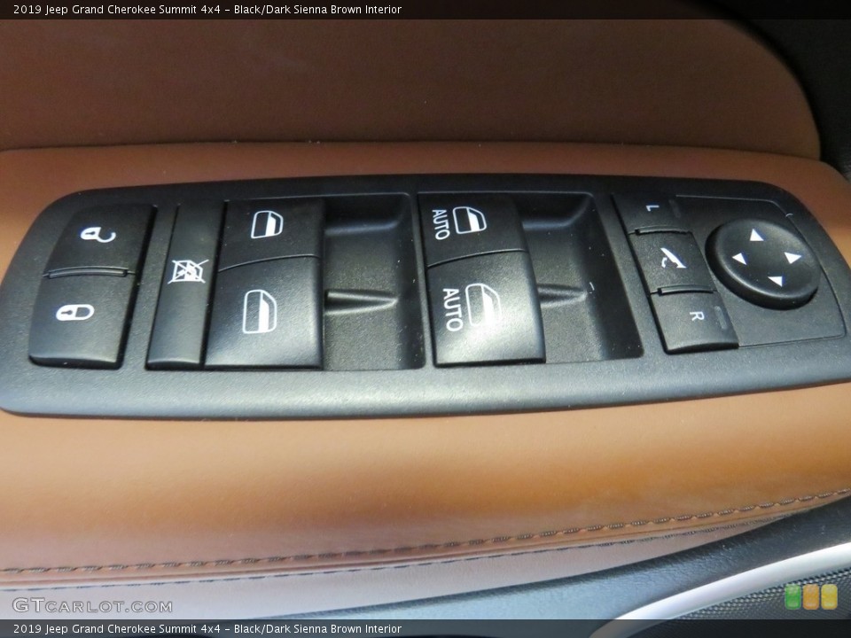 Black/Dark Sienna Brown Interior Controls for the 2019 Jeep Grand Cherokee Summit 4x4 #130530397
