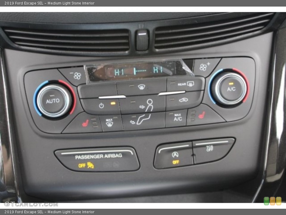 Medium Light Stone Interior Controls for the 2019 Ford Escape SEL #130575768