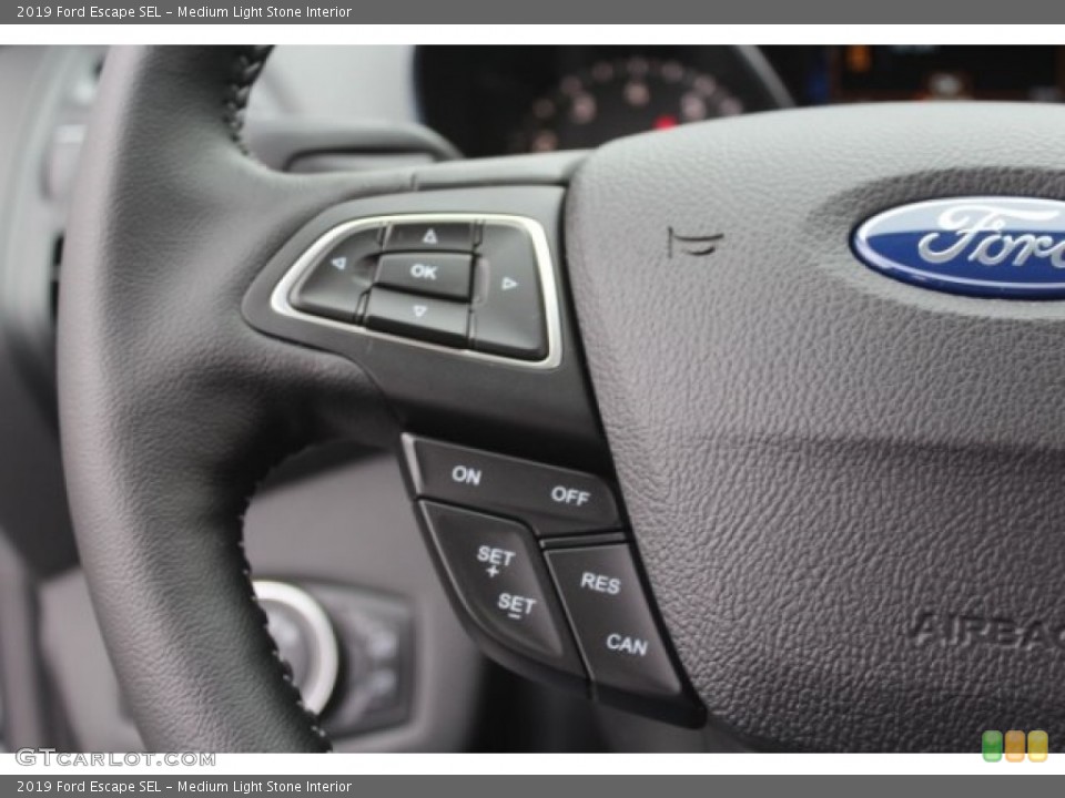 Medium Light Stone Interior Steering Wheel for the 2019 Ford Escape SEL #130575804