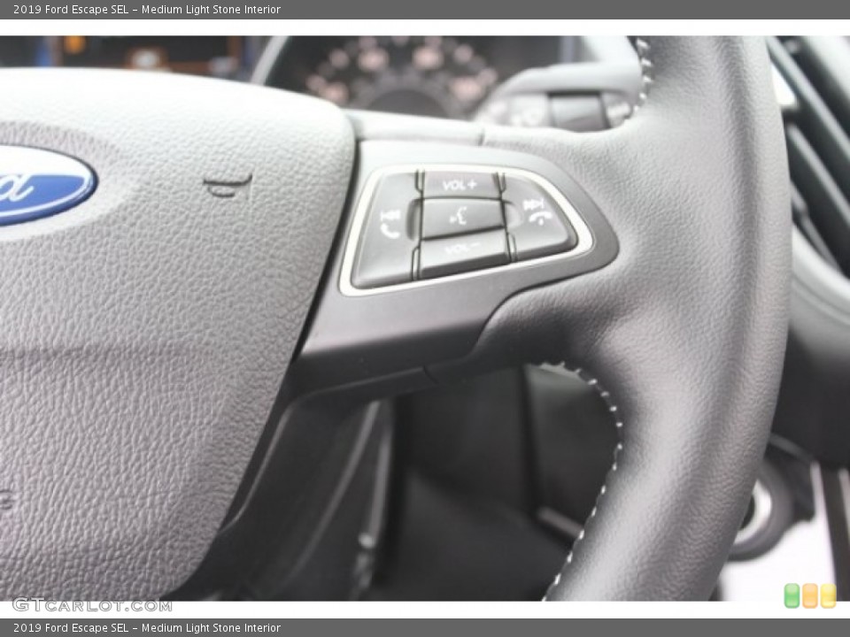 Medium Light Stone Interior Steering Wheel for the 2019 Ford Escape SEL #130575822