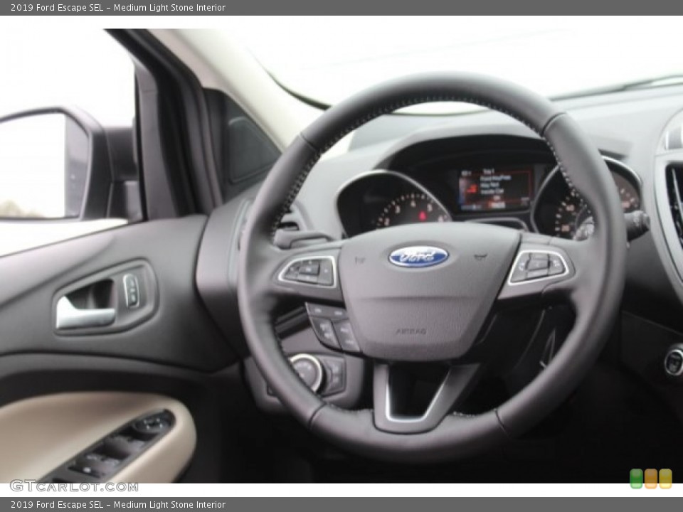 Medium Light Stone Interior Steering Wheel for the 2019 Ford Escape SEL #130575906