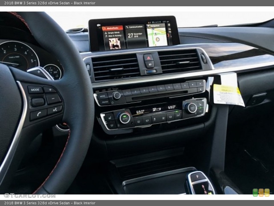 Black Interior Controls for the 2018 BMW 3 Series 328d xDrive Sedan #130640904
