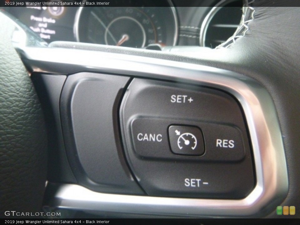 Black Interior Steering Wheel for the 2019 Jeep Wrangler Unlimited Sahara 4x4 #130659230