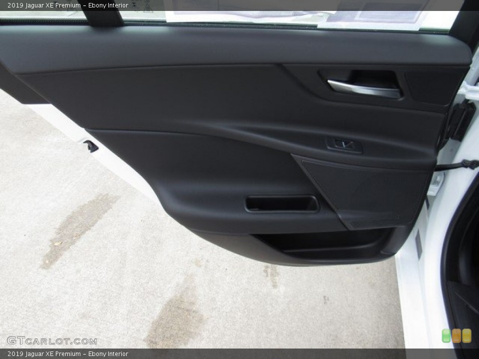 Ebony Interior Door Panel for the 2019 Jaguar XE Premium #130697116