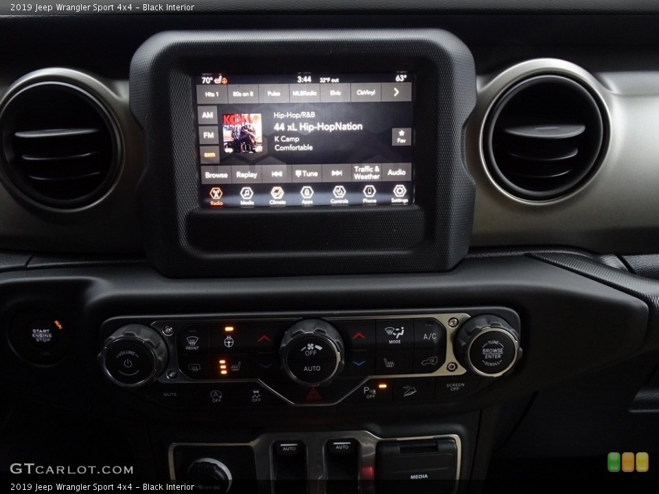 Black Interior Controls for the 2019 Jeep Wrangler Sport 4x4 #130768716