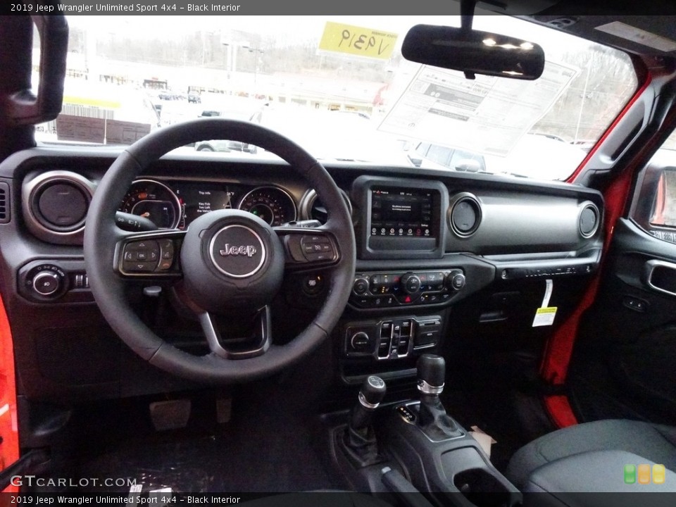 Black Interior Dashboard for the 2019 Jeep Wrangler Unlimited Sport 4x4 #130769190