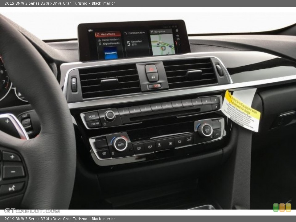 Black Interior Controls for the 2019 BMW 3 Series 330i xDrive Gran Turismo #130777503