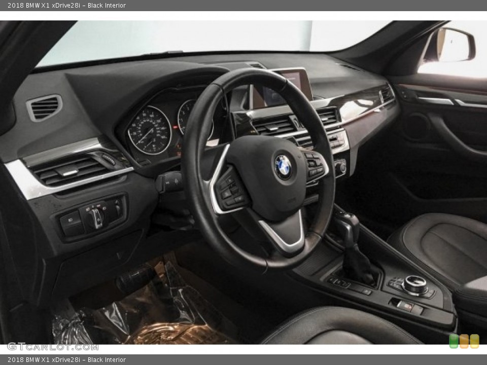 Black Interior Dashboard for the 2018 BMW X1 xDrive28i #130793343