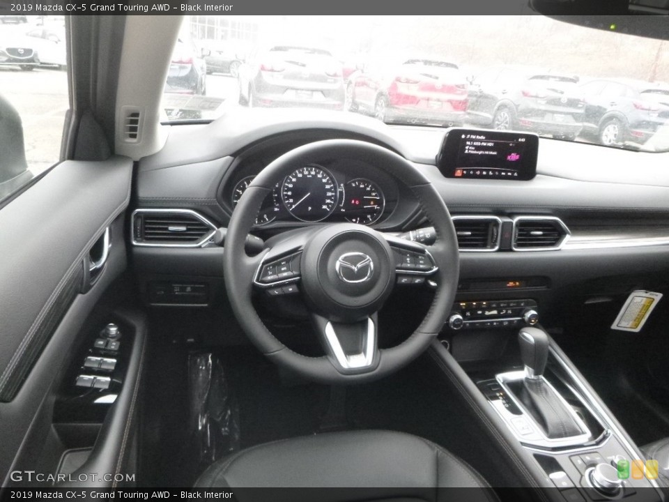 Black Interior Front Seat for the 2019 Mazda CX-5 Grand Touring AWD #130851492