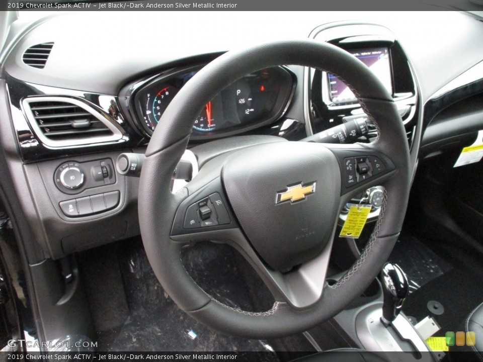 Jet Black/­Dark Anderson Silver Metallic Interior Steering Wheel for the 2019 Chevrolet Spark ACTIV #130906564