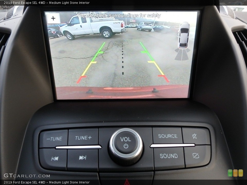 Medium Light Stone Interior Controls for the 2019 Ford Escape SEL 4WD #130958004