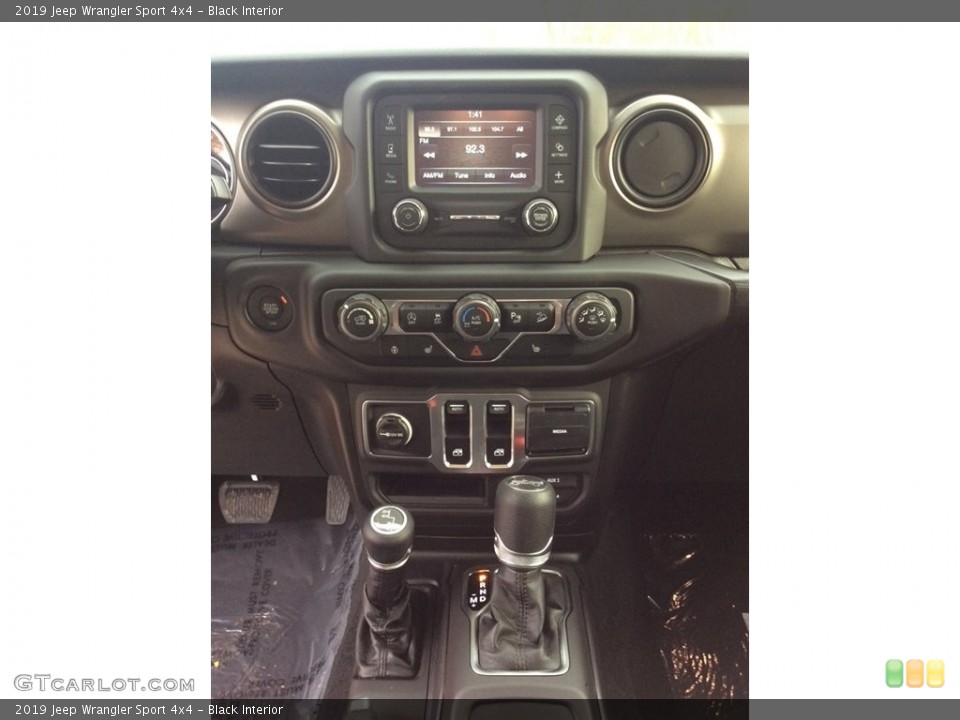 Black Interior Controls for the 2019 Jeep Wrangler Sport 4x4 #131049128