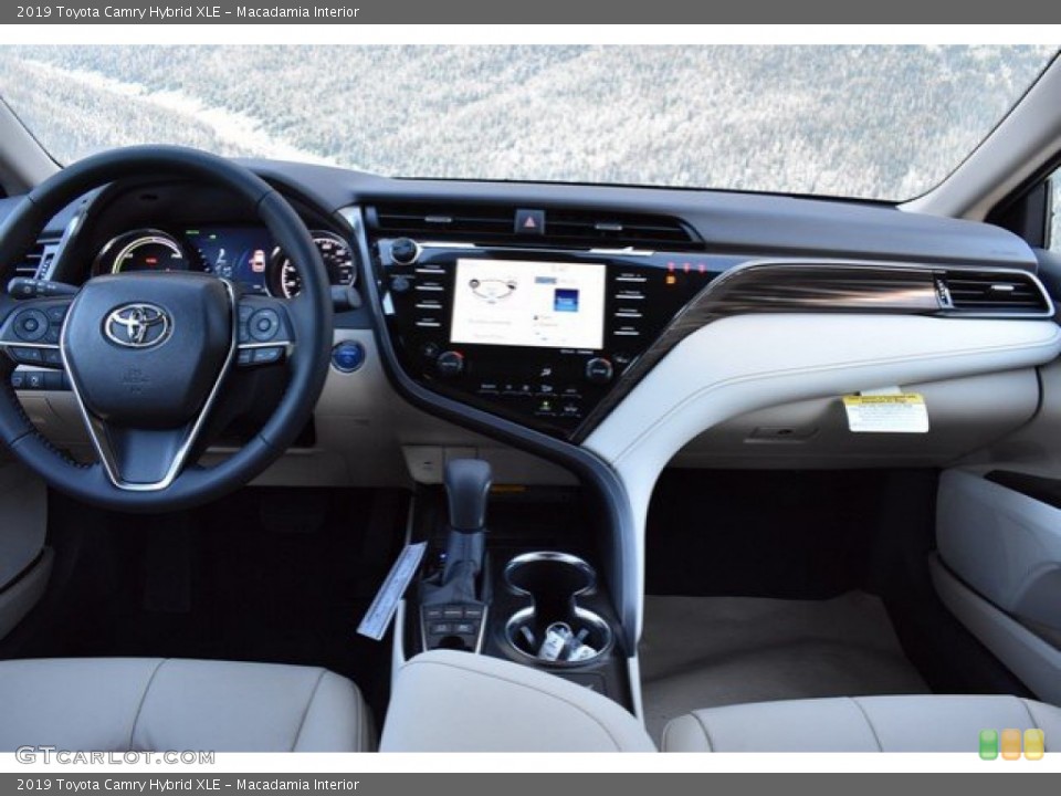 Macadamia Interior Dashboard for the 2019 Toyota Camry Hybrid XLE #131115975