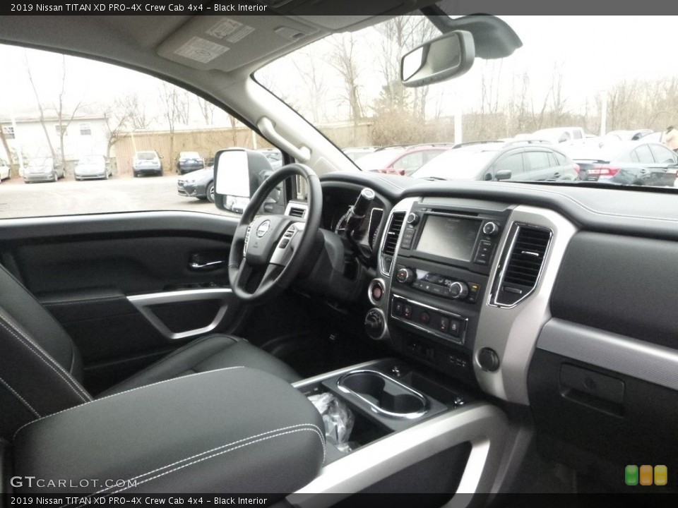 Black Interior Dashboard for the 2019 Nissan TITAN XD PRO-4X Crew Cab 4x4 #131152888
