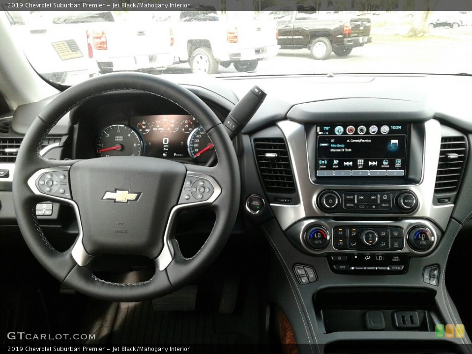 Jet Black/Mahogany Interior Controls for the 2019 Chevrolet Suburban Premier #131236224