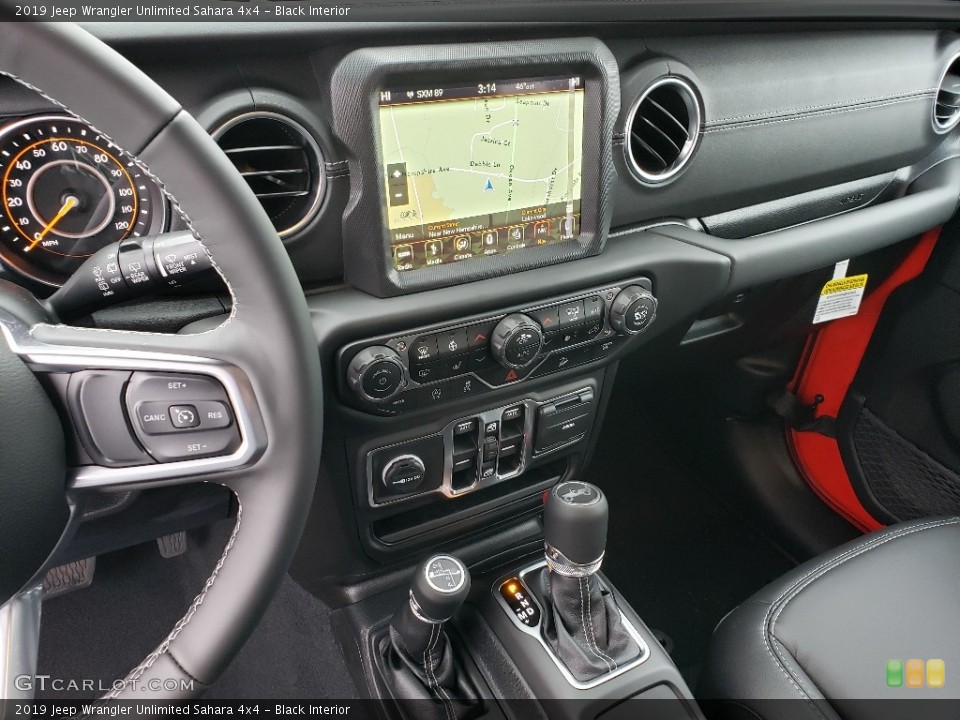 Black Interior Dashboard for the 2019 Jeep Wrangler Unlimited Sahara 4x4 #131320923