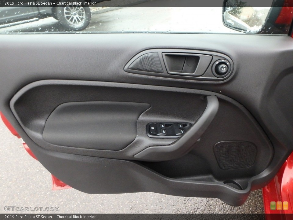 Charcoal Black Interior Door Panel for the 2019 Ford Fiesta SE Sedan #131347895
